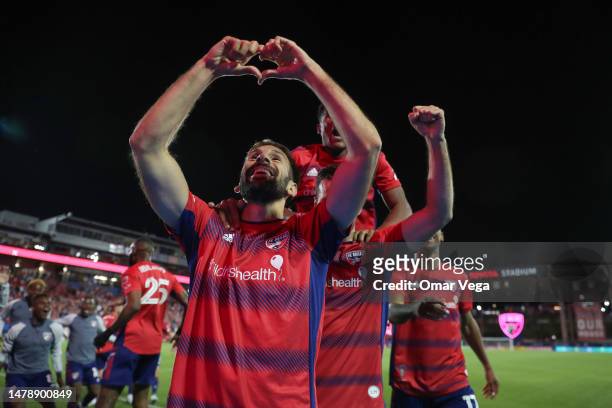 Facundo Quigñon of FC Dallas celebrates with his teammates after scoring his team's first goal during the MLS game between Portland Timbers and FC...