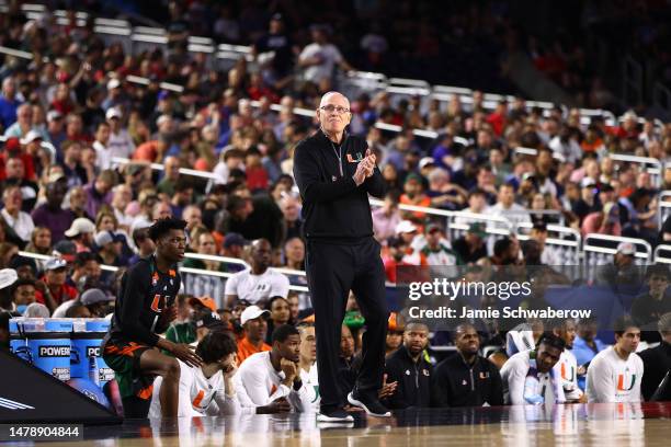 Head coach Jim Larrañaga of the Miami Hurricanes claps in the first half during the NCAA Men’s Basketball Tournament Final Four semifinal game...