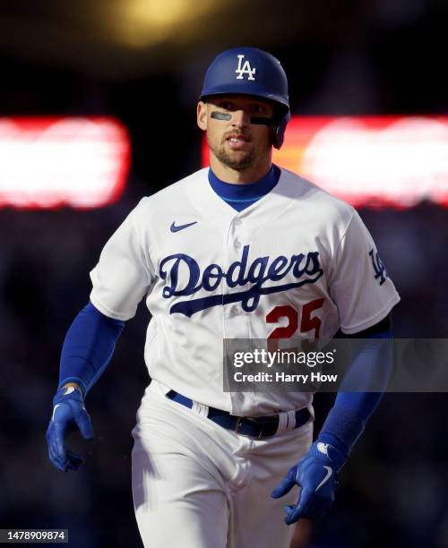 Trayce Thompson of the Los Angeles Dodgers reacts to his solo homerun, his third homerun of the game, to take a 10-1 lead over the Arizona...