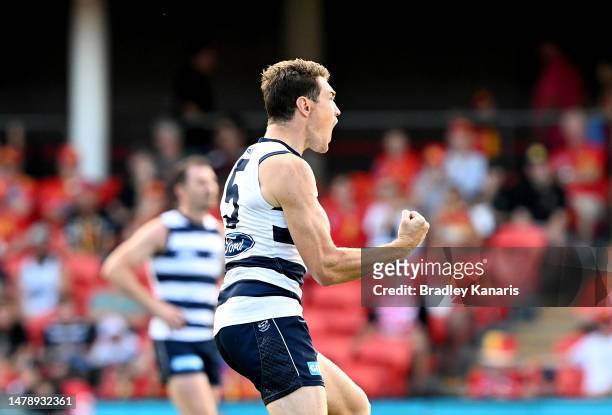 Jeremy Cameron of the Cats celebrates after kicking a goal during the round three AFL match between Gold Coast Suns and Geelong Cats at Heritage Bank...