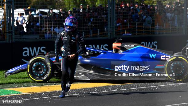 Alexander Albon of Thailand and Williams walks from his car after a crash that led to a red flag during the F1 Grand Prix of Australia at Albert Park...