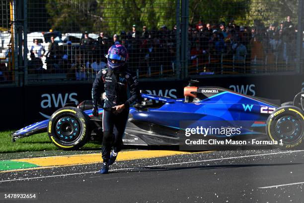 Alexander Albon of Thailand and Williams walks from his car after a crash that led to a red flag during the F1 Grand Prix of Australia at Albert Park...