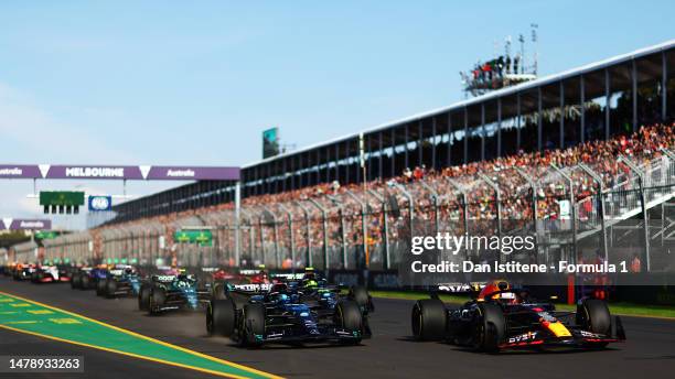 Max Verstappen of the Netherlands driving the Oracle Red Bull Racing RB19 leads George Russell of Great Britain driving the Mercedes AMG Petronas F1...