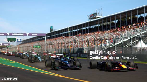 Max Verstappen of the Netherlands driving the Oracle Red Bull Racing RB19 leads George Russell of Great Britain driving the Mercedes AMG Petronas F1...