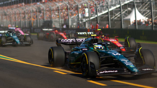 Fernando Alonso of Spain driving the Aston Martin AMR23 Mercedes at the start during the F1 Grand Prix of Australia at Albert Park Grand Prix Circuit...