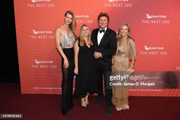 Christian Wilkins, Rebecca Wilkins, Richard Wilkins and Nicole Dale attend the Qantas 100th Gala Dinner at hangar 96 at Sydney's International...