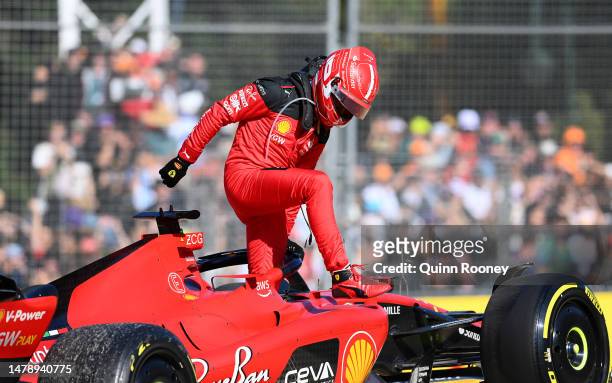 Charles Leclerc of Monaco and Ferrari climbs from his car after retiring from the race during the F1 Grand Prix of Australia at Albert Park Grand...