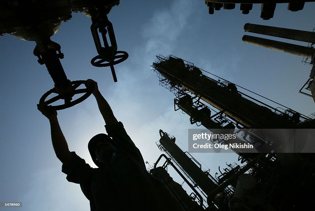 Iraqi Oil Worker Works In Refinery
