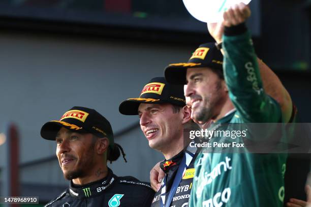 Race winner Max Verstappen of the Netherlands and Oracle Red Bull Racing, Second placed Lewis Hamilton of Great Britain and Mercedes and Third placed...