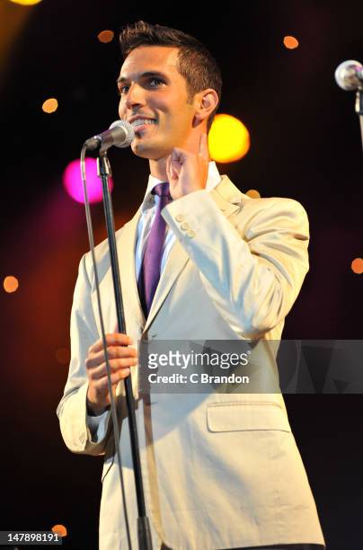 Ari Shapiro of Pink Martini performs on stage for Kew The Music at Kew Gardens on July 5, 2012 in London, United Kingdom.