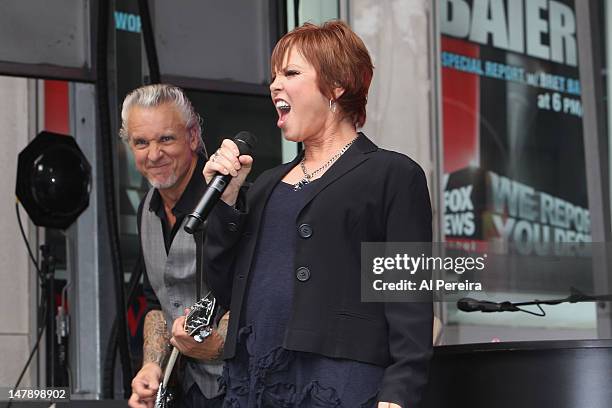 Guitarist Neil Giraldo and singer Pat Benatar perform during "FOX & Friends" All American Concert Series at FOX Studios on June 29, 2012 in New York...