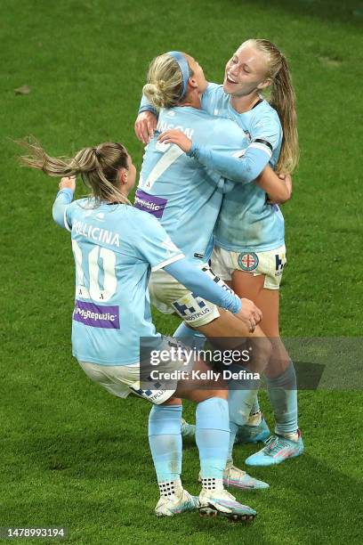 Holly McNamara of Melbourne City celebrates scoring a goal with Hannah Wilkinson of Melbourne City and Rhianna Pollicina of Melbourne City during the...