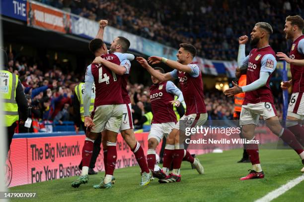 John McGinn of Aston Villa scores for Aston Villa during the Premier League match between Chelsea FC and Aston Villa at Stamford Bridge on April 01,...