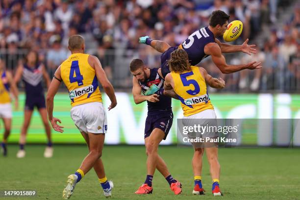 Lachie Schultz of the Dockers marks the ball during the round three AFL match between Fremantle Dockers and West Coast Eagles at Optus Stadium, on...