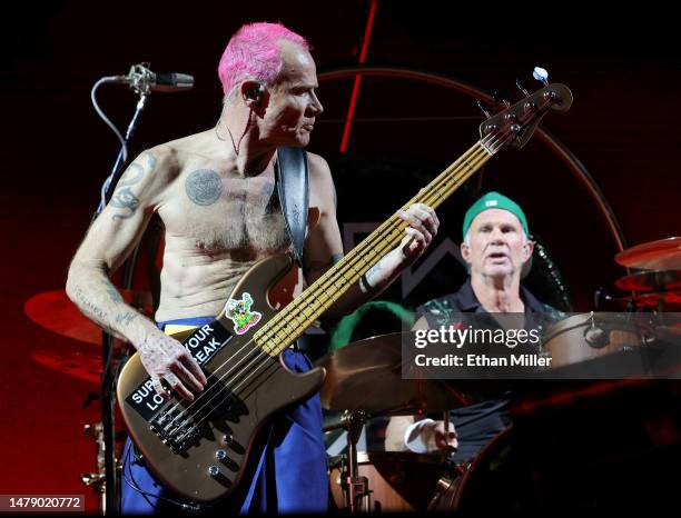 Bassist Flea and drummer Chad Smith of Red Hot Chili Peppers perform at Allegiant Stadium on April 01, 2023 in Las Vegas, Nevada.