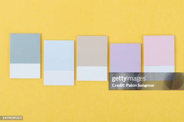 yellow background with empty sticky notes for your text or message. - bulletin board border stock pictures, royalty-free photos & images