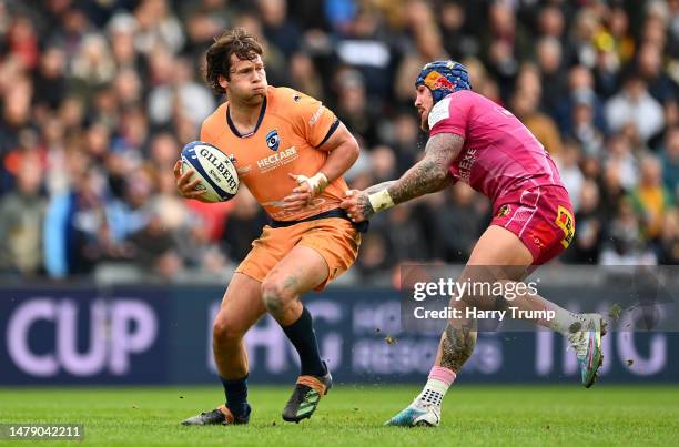 Jan Serfontein of Montpellieris tackled by Jack Nowell of Exeter Chiefs during the Heineken Champions Cup Round Of Sixteen match between Exeter...