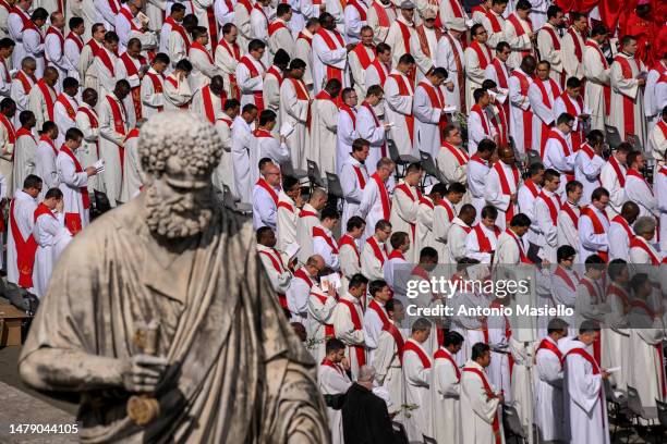 Priests attend the Palm Sunday Mass at St. Peter's Square on April 2, 2023 in Vatican City, Vatican. The 86-year-old pontiff was recently released...