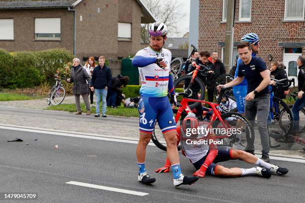 Peter Sagan of Slovakia and Team TotalEnergies and Jasper Stuyven of Belgium and Team Trek-Segafredo after being involved in a crash during the 107th...