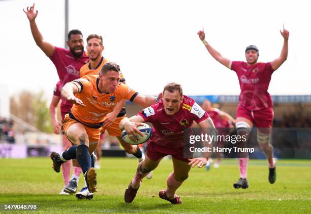 Tom Wyatt of Exeter Chiefs goes over to score their sides third try during the Heineken Champions Cup Round Of Sixteen match between Exeter Chiefs...