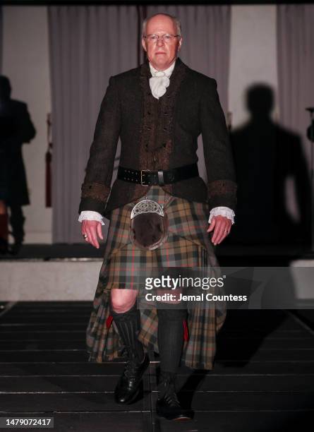 Jeff Perry walks the runway at the Dressed to Kilt 20th Anniversary Fashion show & Gala at Omni Shoreham Hotel on April 01, 2023 in Washington, DC.