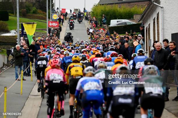 General view of the peloton competing compete while fans cheers during the 20th Ronde van Vlaanderen - Tour des Flandres 2023, Women's Elite a...