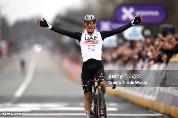 Tadej Pogacar of Slovenia and UAE Team Emirates celebrates at finish line as race winner during the 107th Ronde van Vlaanderen - Tour des Flandres...