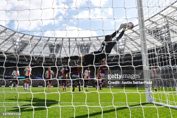 Gavin Bazunu of Southampton makes a save during the Premier League match between West Ham United and Southampton FC at London Stadium on April 02,...