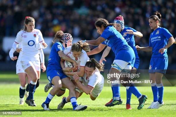 Zoe Aldcroft of England is tackled by Alice Cassaghi of Italy during the TikTok Women's Six Nations match between England and Italy at Franklin's...