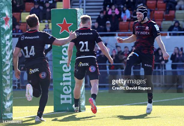 Duncan Taylor of Saracens celebrates after scoring their third try during the Heineken Champions Cup match between Saracens and Ospreys at the StoneX...