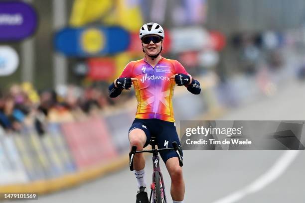 Lotte Kopecky of Belgium and Team SD Worx celebrates at finish line as race winner during the 20th Ronde van Vlaanderen - Tour des Flandres 2023,...