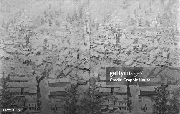 Stereoscopic image showing an aerial view of Lee Street and the surrounding streets in Deadwood, Dakota Territory , 1885.