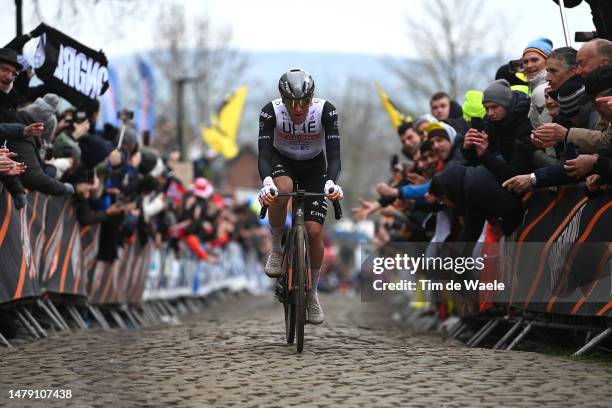 Tadej Pogacar of Slovenia and UAE Team Emirates competes at Oude Kwaremont cobblestones sector during the 107th Ronde van Vlaanderen - Tour des...