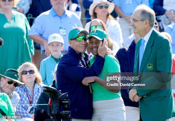 Maya Palanza Gaudin of The United States is congratulated by her father Steve Gaudin beside the 18th green as they realise that she has won the Girls...