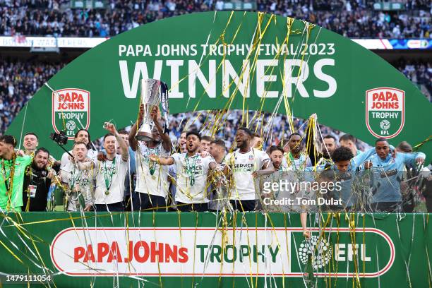 Ricardo Santos of Bolton Wanderers lifts the Papa John's Trophy following their victory in the Papa John's Trophy Final between Bolton Wanderers and...