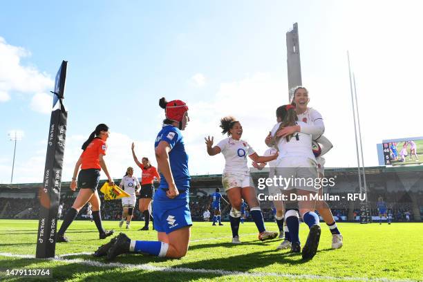 Jessica Breach of England celebrates scoring their side's ninth try with teammates during the TikTok Women's Six Nations match between England and...