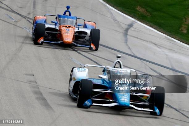 Josef Newgarden, driver of the PPG Team Penske Chevrolet, and Scott Dixon, driver of the PNC Bank Chip Ganassi Racing Honda, race during the NTT...