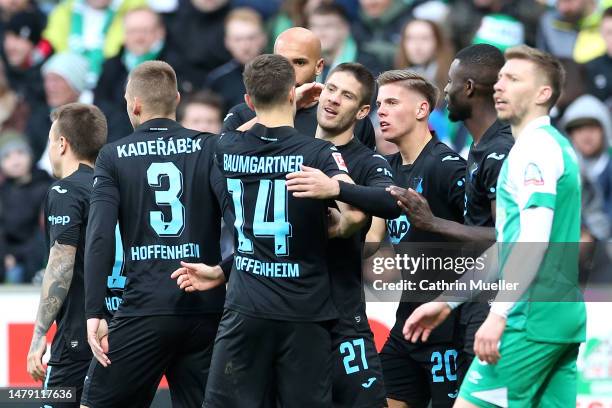Andrej Kramaric of TSG Hoffenheim celebrates after scoring the team's first goal with teammates during the Bundesliga match between SV Werder Bremen...