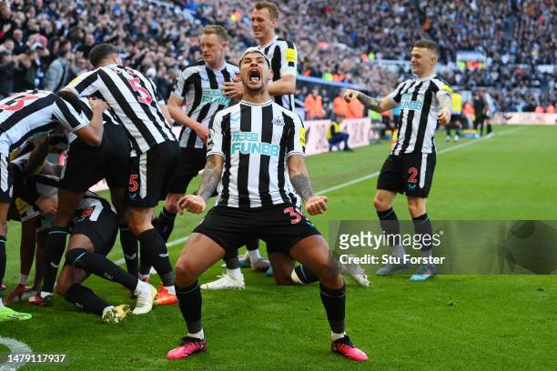 Bruno Guimaraes of Newcastle United celebrates after teammate Joe Willock scores the teams first goal during the Premier League match between...