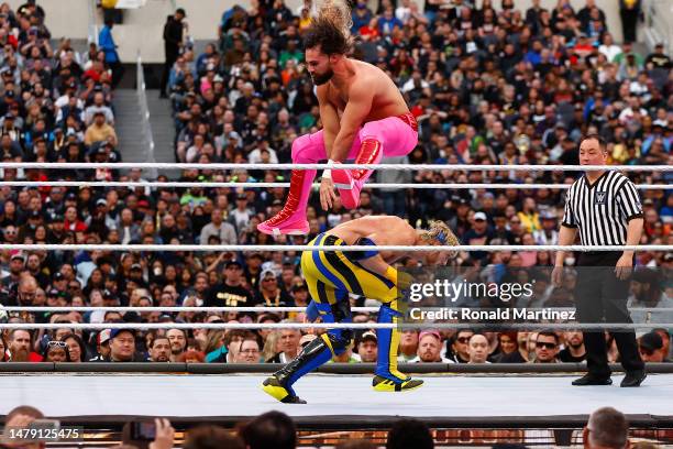 Logan Paul wrestles Seth Rollins during WrestleMania Goes Hollywood at SoFi Stadium on April 01, 2023 in Inglewood, California.
