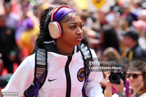 Angel Reese of the LSU Lady Tigers enters the stadium on the red carpet before playing against the Iowa Hawkeyes during the 2023 NCAA Women's...