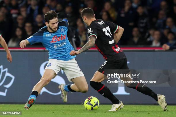Khvicha Kvaratskhelia of SSC Napoli battles for possession with Rade Krunic of AC Milan during the Serie A match between SSC Napoli and AC Milan at...