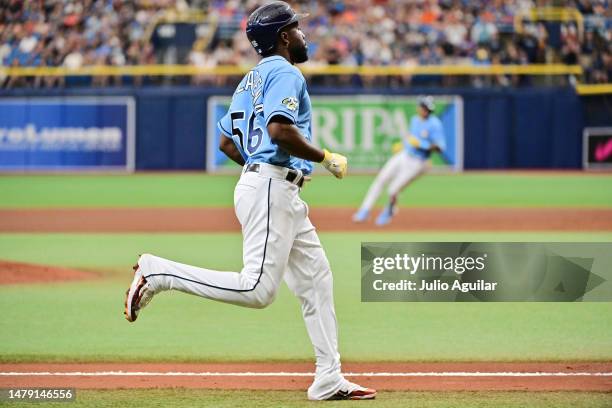 Randy Arozarena of the Tampa Bay Rays runs home after Jose Siri hit a 2-RBI single in the sixth inning against the Detroit Tigers at Tropicana Field...