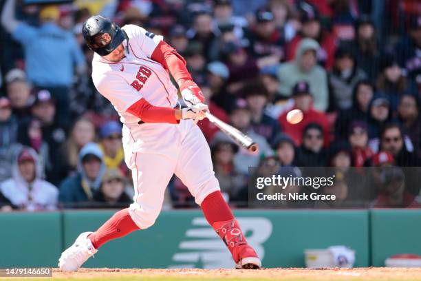 Adam Duvall of the Boston Red Sox hits an RBI double during the fifth inning against the Baltimore Orioles at Fenway Park on April 02, 2023 in...