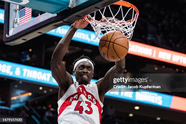 Pascal Siakam of the Toronto Raptors dunks the ball against the Charlotte Hornets in the third quarter during their game at Spectrum Center on April...