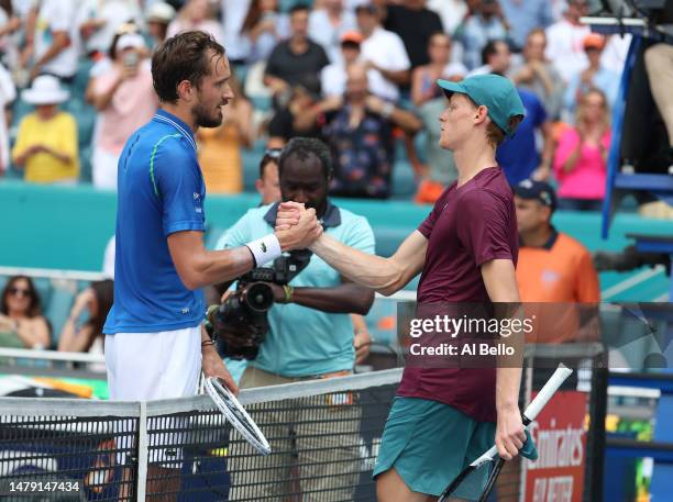 Daniil Medvedev of Russia meets Jannik Sinner of Italy after defeating him during the Mens Finals of the Miami Open at Hard Rock Stadium on April 02,...