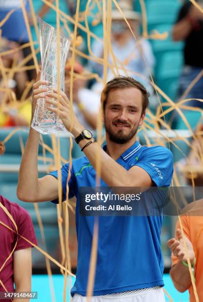 Daniil Medvedev of Russia holds the Butch Buchholz Trophy after defeating Jannik Sinner of Italy after defeating him during the Mens Finals of the...