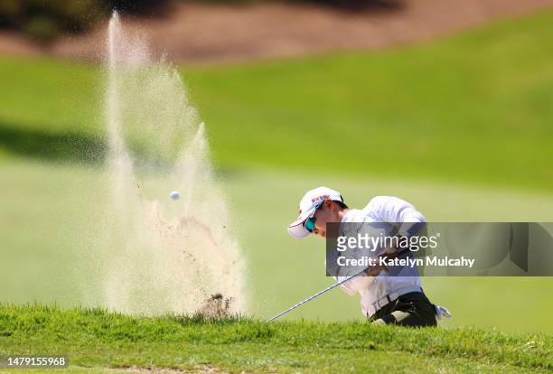 Hyo Joo Kim of South Korea plays a shot from a bunker on the first hole during the final round of the DIO Implant LA Open at Palos Verdes Golf Club...