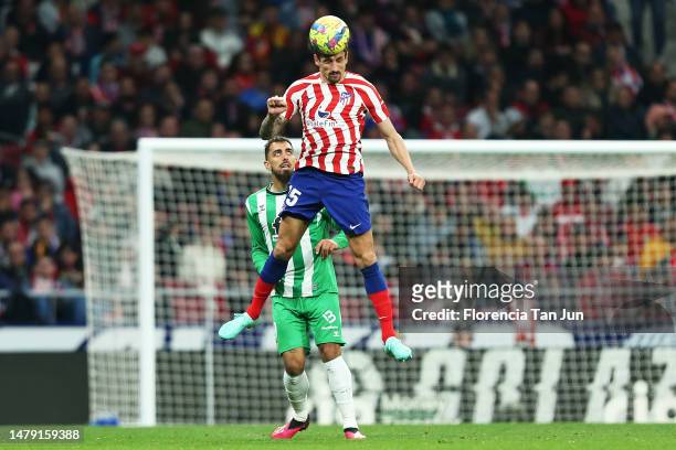 Stefan Savic of Atletico Madrid wins a header against Rui Silva of Real Betis during the LaLiga Santander match between Atletico de Madrid and Real...