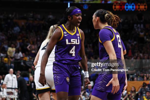 Flau'jae Johnson and Last-Tear Poa of the LSU Lady Tigers react during the second quarter against the Iowa Hawkeyes during the 2023 NCAA Women's...